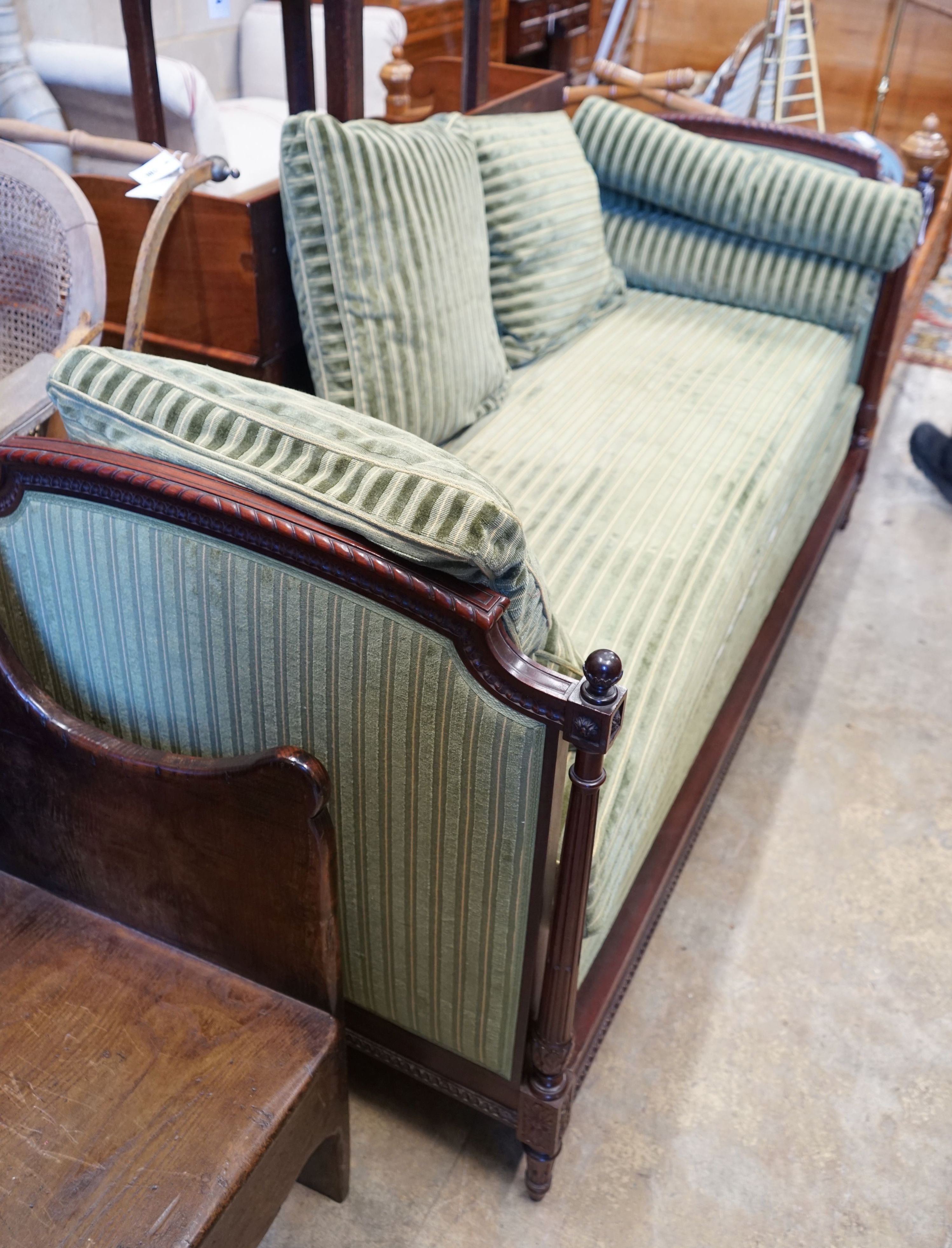 An early 20th century French mahogany day bed, width 184cm depth 80cm height 90cm